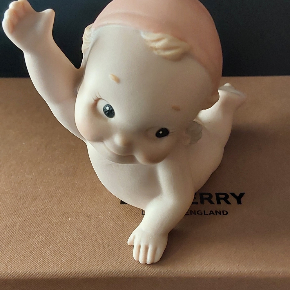 Enesco Kewpie Wearing Red Winter Stocking Cap On Tummy Raising Arm  1992 Jesco